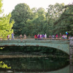 People standing on Lullwater Bridge
