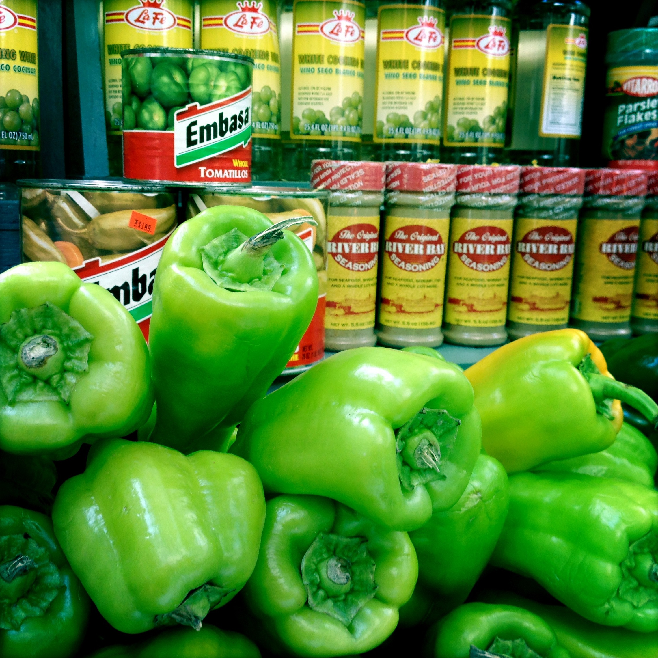 Green peppers and spices for sale at the Moore Street Market