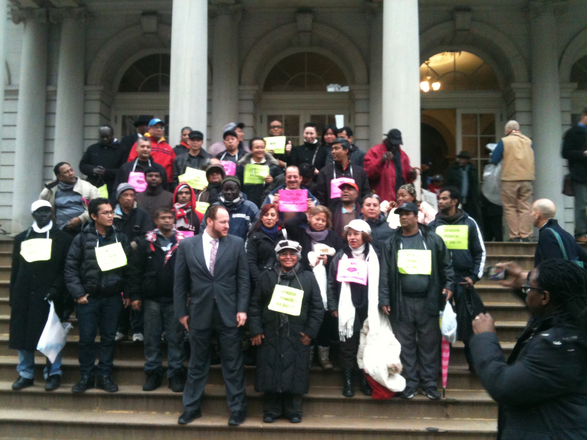 Vendors and supports gather with Councilman David Greenfield (CD 4) on the steps of City Hall
