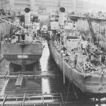 USS Menges and USS Holder being repaired in dry dock 5 or 6, 1944
