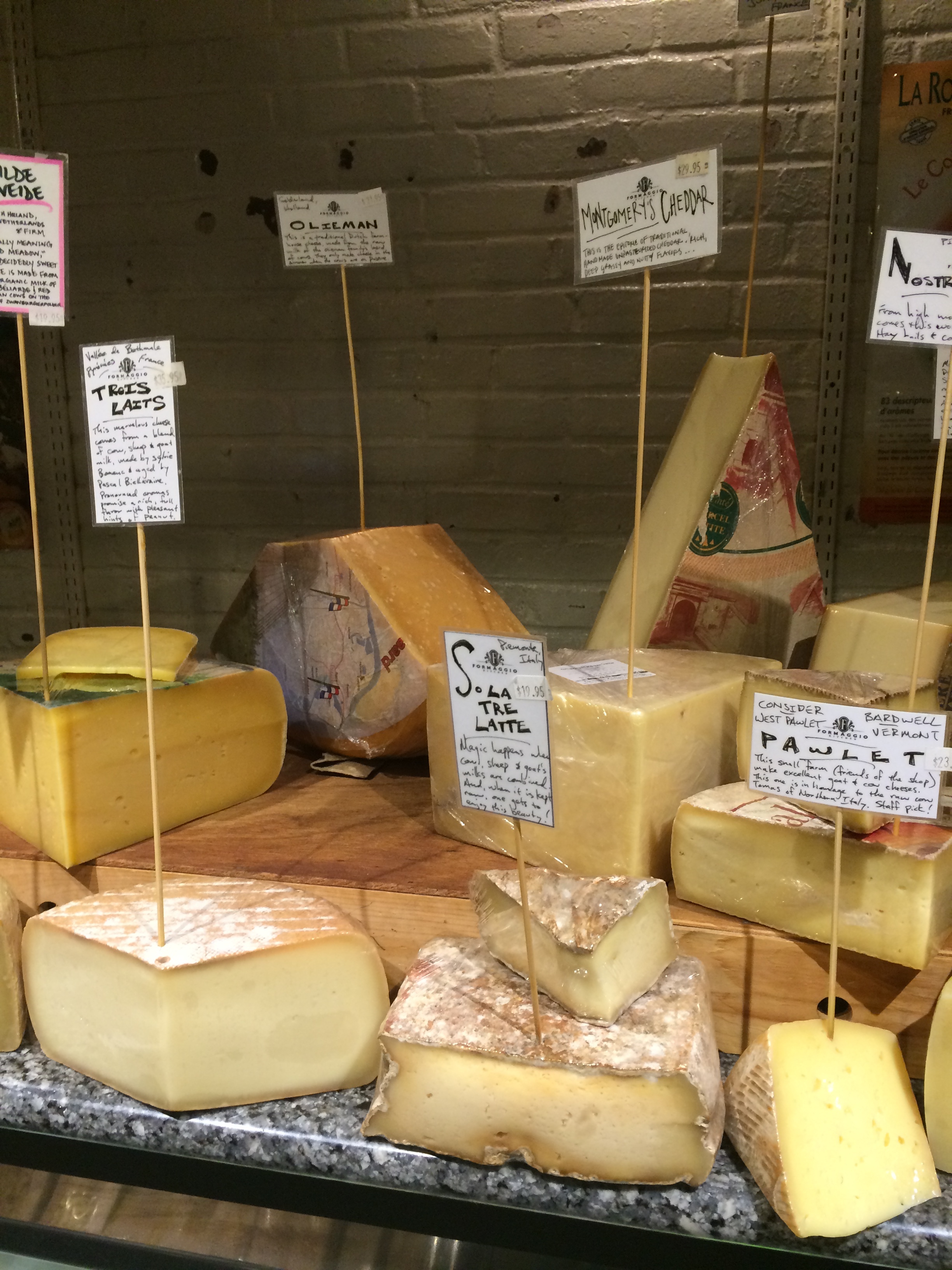 A variety of cheeses on display at Formaggio Essex at Essex Street Market