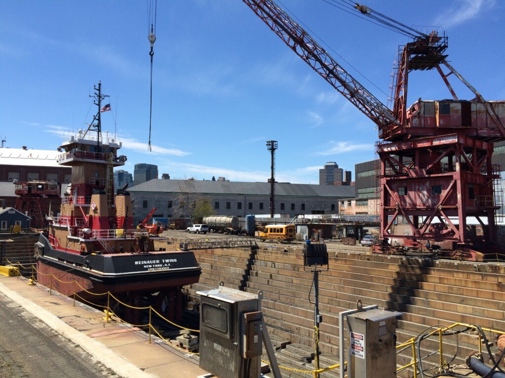 Tugboat being repaired in Brooklyn Navy Yard Dry Dock No. 1, operated by GMD.