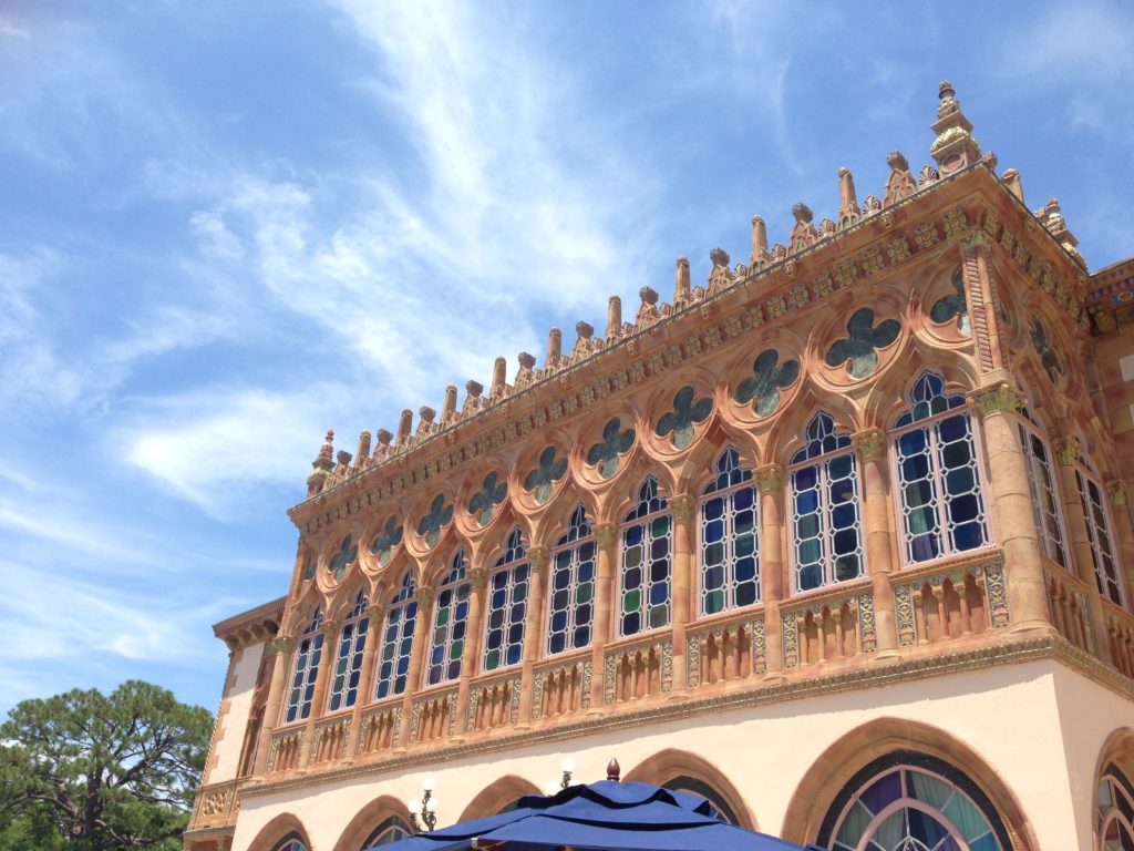 Ornate features and stained glass windows of the back of the Ca' d'Zan mansion at the Ringling Estate