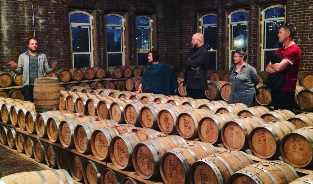 Colin leading a tour in Kings County Distillery barrel room