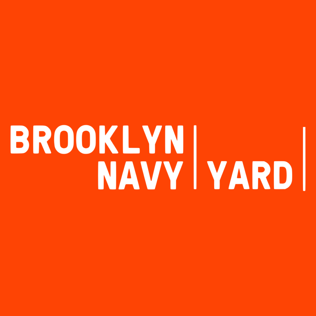 Brooklyn Navy Yard logo. White text with block lettering with orange background.